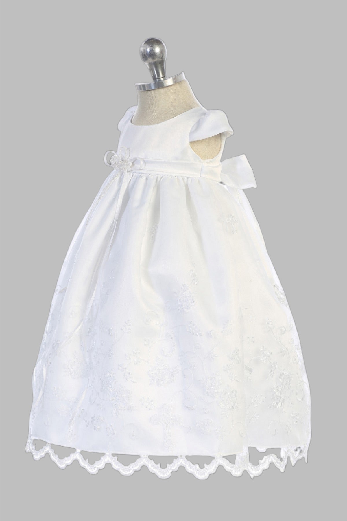 Affordable Christening Gown With Cross Embroidered Hem with a white bonnet for with cross Christening or Baptizing a baby girl